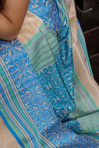 Bengal tussar in natural tussar and blue colour with detailed weaving in border